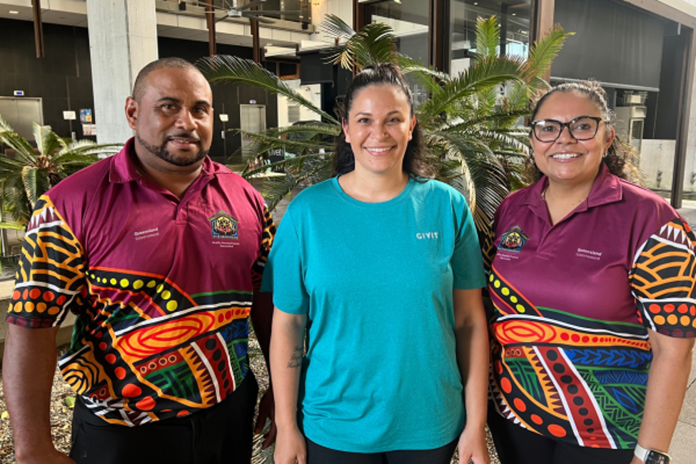 GIVIT Engagement Officer Temiah with two staff members (one male, one female) from the Queensland Government's Healthy Housing Program.